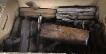 A box containing assorted antique moulding planes, variously stamped including 