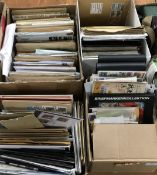 Four boxes of various first day covers, envelopes with stamps and loose envelopes, etc.