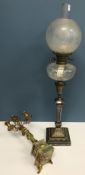 A circa 1900 plated candlestick oil lamp with fluted and fan decoration,