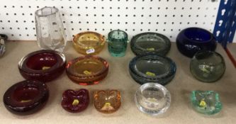 A collection of Whitefriars bubble glassware in ruby, amber, emerald, Bristol blue,