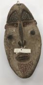A Maprik East Sepik mask decorated with