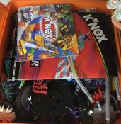 A biscuit box containing a collection of