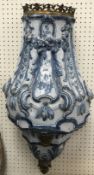 An 18th Century Dutch Delft wall cistern