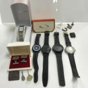 A box containing five various wristwatch