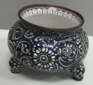A Limoges enamel pot of cauldron form in