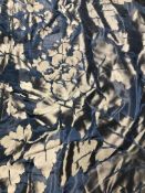 Two pairs of curtains in shot silk type fabric in navy and brown with a foliate design,