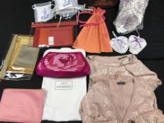 A box containing a Lulu Guinness handbag, Easton Pearson sequinned twinset,