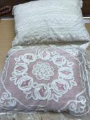 A box containing a pair of corded fabric curtains, one curtain lined with red wool felt,