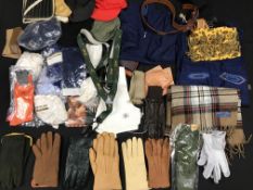 A box containing an assortment of gentlemen's outdoor and sporting accoutrements including leather