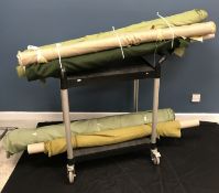 Eleven part rolls of furnishing fabrics to include linen weaves etc all in a green colouration