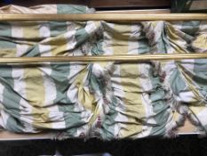 A set of four gilded curtain poles each approx.