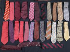 A box containing a large quantity of silk ties (over 75),
