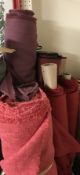 Nine part rolls of furnishing fabrics to include linen weaves etc all in tones of red