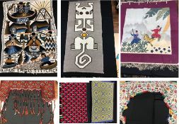A box containing a collection of seven rugs and hangings of various ethnicities,