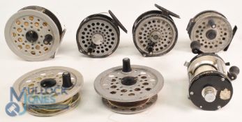 A large collection of reels, as follows: Shakespeare Beaulite alloy salmon fly reel with 2 spare