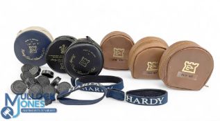 A collection of Hardy reel accessories, as follows: 3x leather zipped sheepskin lined cases with