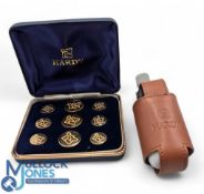 A set of twelve Hardy Brass Buttons, in original case, plus a small jacket clip on Hardy fly-fishing
