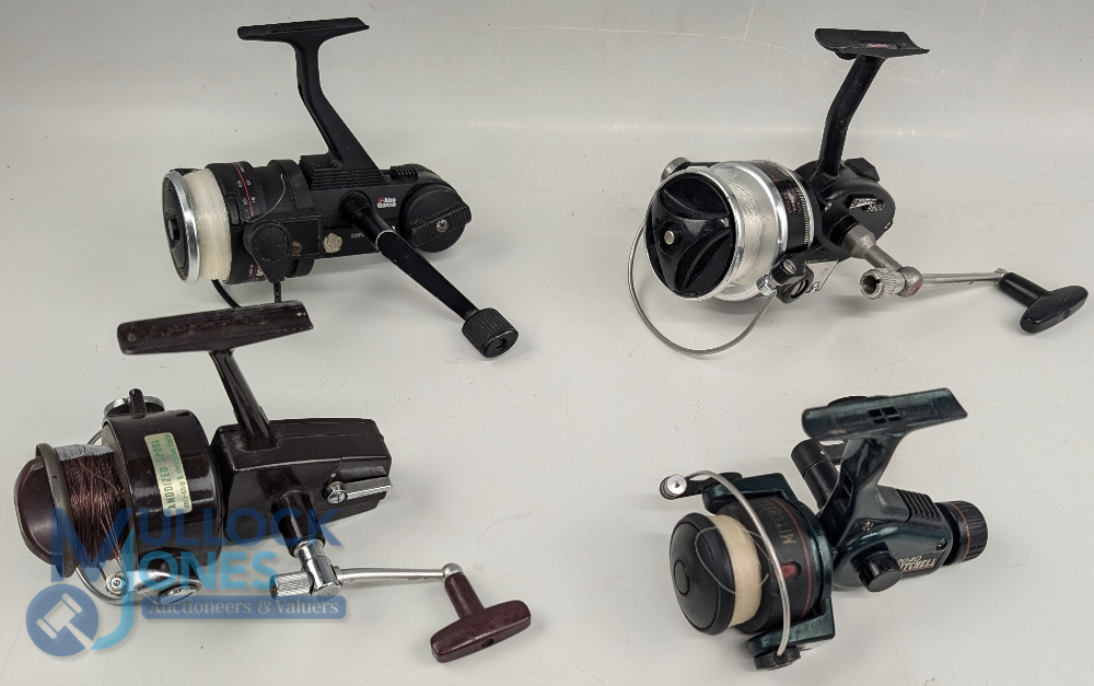 4x Fixed spool reels features Garcia 9600 made in Japan, black finish, plus Abu Garcia 854 reel in