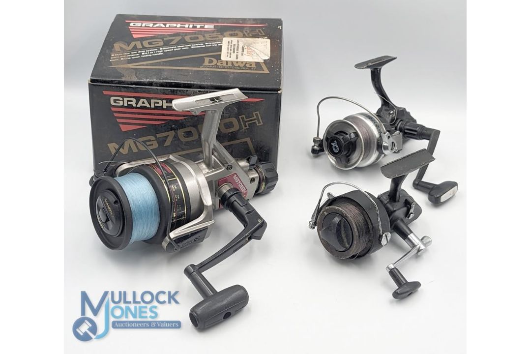 Daiwa MG 7050 H large graphite fixed spool reel, good bail, rear tensioner, original box with - Image 1 of 2