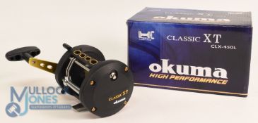 Okuma Classic XT CLX-400S composite multiplier sea reel, ‘T' shaped counter balanced handle, on/