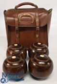 A leather Slazenger Bowls bag, with four official BIB 1963 bowls size 1-4 in used condition
