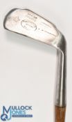 Unusual designed mashie by Gibson of Kinghorn with extended central sole section showing the