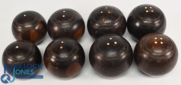 Two sets of four vintage lawn bowls, size 1-4, in used condition