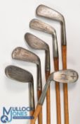 6x Assorted clubs incl left hand round toed mashie stamped Joy model by Winton, Excelsior niblick,