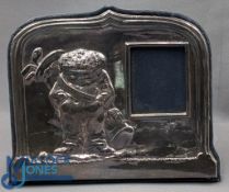 A Silver Hallmarked golf themed easel back photograph frame, by John Bull Ltd, London 1994, repousse