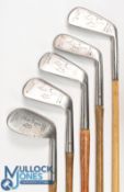4x Matching Walter Hagen Golf clubs to include a 4 iron, mashie, jigger and niblick - all fitted