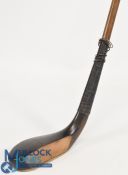 c1875 R Forgan of St Andrews longnose dark stained beechwood putter with slightly hocked face, the