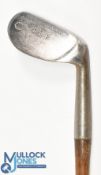Foulis Patent mashie niblick with very flat sole and high rounded head smooth faced c.1905, J Foulis