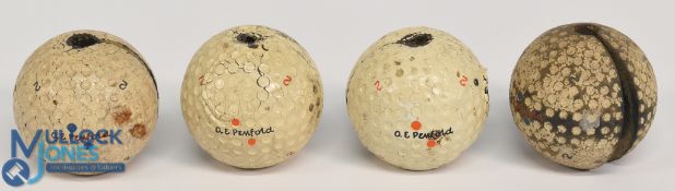 Collection of 4x A E Penfold 'Swingweight Dimple Golf Ball Swing Training Aids - large heavy
