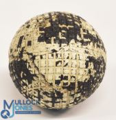 A fine mesh pattern Gutty Golf Ball retaining a fair portion of the original white paint, in good