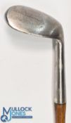Unusual 'Bisque' round backed concave faced niblick for Finnigan's of Manchester stamped with