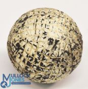 A larger mesh pattern Gutta Percha Golf Ball unnamed in good all round condition, with original