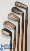 5x Various golf irons to incl Spalding mashie with stag head cleek mark, A. Seymour Molesey Hurst GC