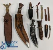 2x Kukri Style Knives, in leather scabbards, plus other novelty knives