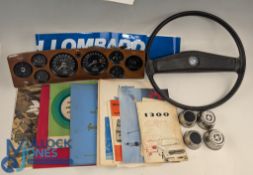 Leyland & Triumph Automobile Parts and Collectibles: a Leyland steering wheel, Leyland hub cap