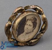 Fine period yellow metal brooch, with swivel fitting for two photographs