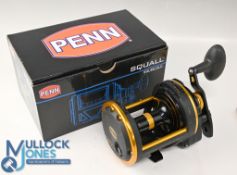 Penn Squall multiplier sea fishing reel, SQL60 LDLH, in as new condition, black/gold finish, c/w rod
