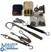 Fly fishing accessories including a brass Cummins style unnamed oiler, a nickel oil pot with screw