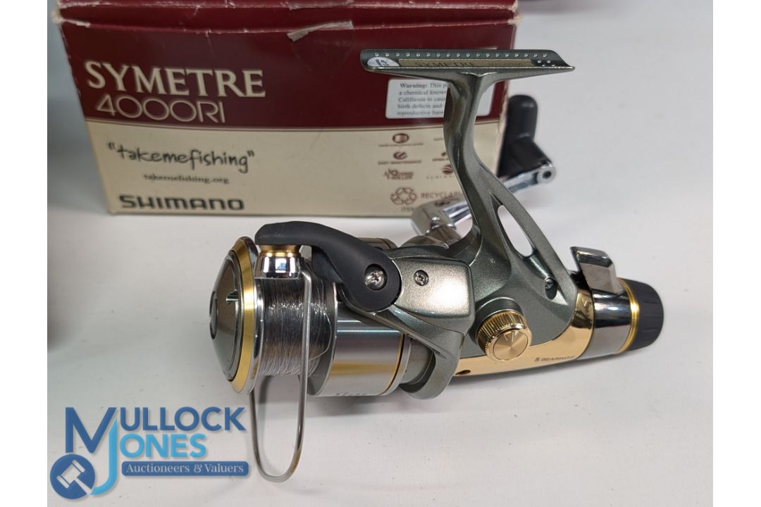 Shimano Symetre 4000RI spinning reel with spare spool, folding handle, appears overall in good - Image 2 of 4