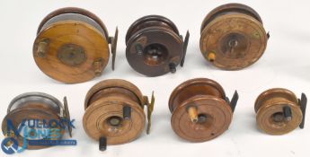 A collection of mahogany, brass and alloy centre pin reels: 4
