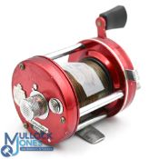 ABU Ambassadeur 6500 multiplier reel in red finish, foot stamped 79110, on/off check, counter