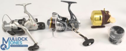 Ultra Cast ULT fixed spool reel with spare spool, good bail, spool tensioner, very light use, runs