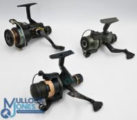 Three Shakespeare spinning reels, Pro-Am X 2140, Alpha RLX 2155 30, and Graphite Mk2 030, all with