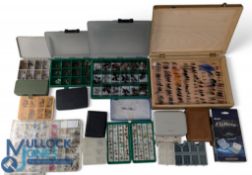 Large quantity of mainly trout flies in variety of plastic compartment boxes, small number of salmon