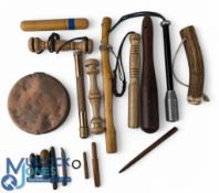 Collection of wood and metal priests, a copper cast stamper with pads, various rod accessories