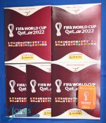 2022 Panini World Cup Qatar Sticker Albums, one complete, four empty, a swap tin and #270 loose